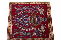 Surface texture of 2000s Mashad rug with natural Wool and intricate pattern