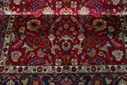 Close-up detail of 2000s Mashad rug from Iran / Persia showing Wool weave