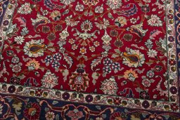 Close-up detail of 2000s Mashad rug from Iran / Persia showing Wool weave
