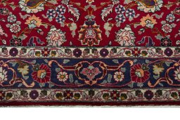 Full view of 2000s Mashad rug from Iran / Persia, 213 × 139 cm in Red tones