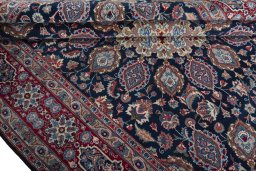 Close-up detail of 1970s Mashad rug from Iran / Persia showing Wool weave
