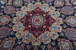 Central medallion detail of 1970s Mashad rug from Iran / Persia