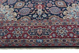 Full view of 1970s Mashad rug from Iran / Persia, 343 × 248 cm in Blue tones