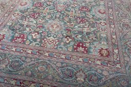 Close-up detail of 1950s Mashad rug from Iran / Persia showing Wool weave