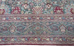 Full view of 1950s Mashad rug from Iran / Persia, 490 × 315 cm in Blue tones