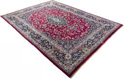 Close-up detail of 2000s Mashad rug from Iran / Persia showing Wool weave