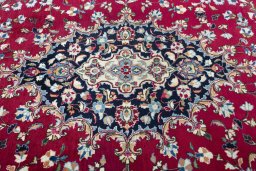 Central medallion detail of 2000s Mashad rug from Iran / Persia