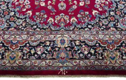 Full view of 2000s Mashad rug from Iran / Persia, 330 × 242 cm in Red tones