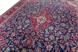 Backside of handmade 2000s Mashad rug showing knot structure and weave density