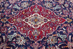 Central medallion detail of 2000s Mashad rug from Iran / Persia