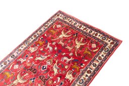 Surface texture of 1990s Mashad rug with natural Wool and intricate pattern
