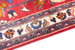 Backside of handmade 1990s Mashad rug showing knot structure and weave density