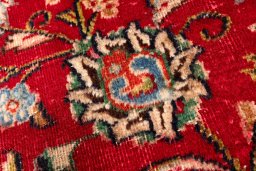 Close-up detail of 2000s Mashad rug from Iran / Persia showing Wool weave