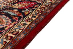 Close-up detail of 2000s Mashad rug from Iran / Persia showing Wool weave