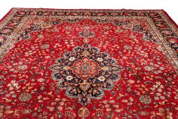 Full view of 2000s Mashad rug from Iran / Persia, 382 × 300 cm in Red tones