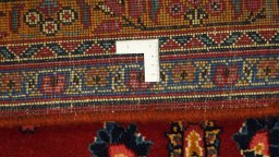 Close-up detail of 2000s Mashad rug from Iran / Persia showing Wool weave