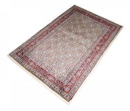 Close-up detail of New Moud rug from Iran / Persia showing Wool weave