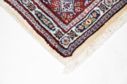 Surface texture of New Moud rug with natural Wool and intricate pattern
