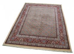 Close-up detail of New Moud rug from Iran / Persia showing Wool weave