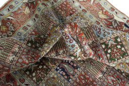 Corner detail of 2000s Moud rug showing border pattern and Wool pile
