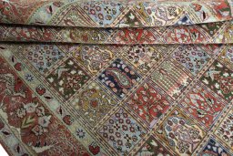 Full view of 2000s Moud rug from Iran / Persia, 300 × 187 cm in Red tones