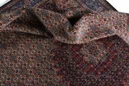 Surface texture of New Moud rug with natural Wool and intricate pattern