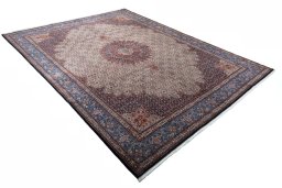 Close-up detail of New Moud rug from Iran / Persia showing Wool weave