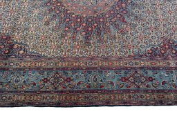 Corner detail of 2000s Moud rug showing border pattern and Wool pile