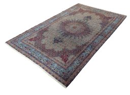 Corner detail of 2000s Moud rug showing border pattern and Wool pile