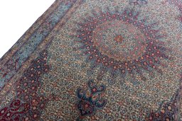 Backside of handmade 2000s Moud rug showing knot structure and weave density