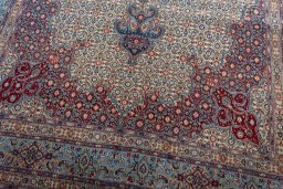 Close-up detail of 2000s Moud rug from Iran / Persia showing Wool weave