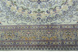 Corner detail of 2000s Moud rug showing border pattern and Wool pile