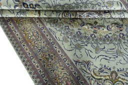 Close-up detail of 2000s Moud rug from Iran / Persia showing Wool weave