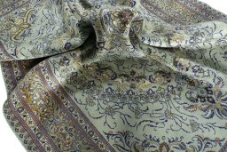 Surface texture of 2000s Moud rug with natural Wool and intricate pattern