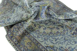 Surface texture of 2000s Moud rug with natural Wool and intricate pattern