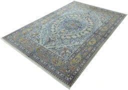Corner detail of 2000s Moud rug showing border pattern and Wool pile
