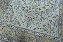 Close-up detail of 2000s Moud rug from Iran / Persia showing Wool weave