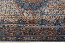 Corner detail of 2000s Moud rug showing border pattern and Wool pile