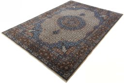 Corner detail of 2000s Moud rug showing border pattern and Wool pile