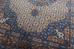Close-up detail of 2000s Moud rug from Iran / Persia showing Wool weave