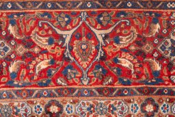 Corner detail of 1970s Moud rug showing border pattern and Wool pile