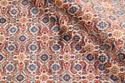 Close-up detail of 1970s Moud rug from Iran / Persia showing Wool weave