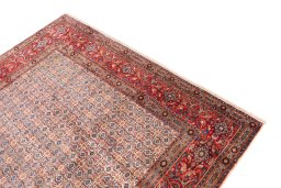 Surface texture of 1970s Moud rug with natural Wool and intricate pattern