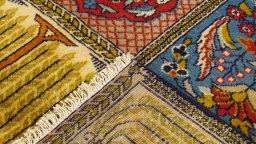 Close-up detail of 1990s Moud rug from Iran / Persia showing Wool weave