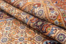 Surface texture of 2020s Moud rug with natural Wool and intricate pattern