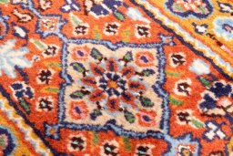 Backside of handmade 2020s Moud rug showing knot structure and weave density