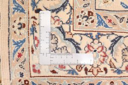 Corner detail of New Nain rug showing border pattern and Wool pile