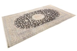 Corner detail of New Nain rug showing border pattern and Wool pile