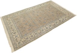 Corner detail of 1960s Nain rug showing border pattern and Wool pile