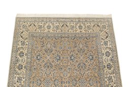 Surface texture of 1960s Nain rug with natural Wool and intricate pattern